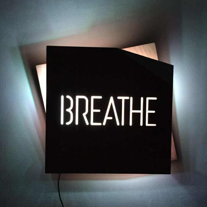 BREATHE - REBELlamps.com wooden LED sign with white light on